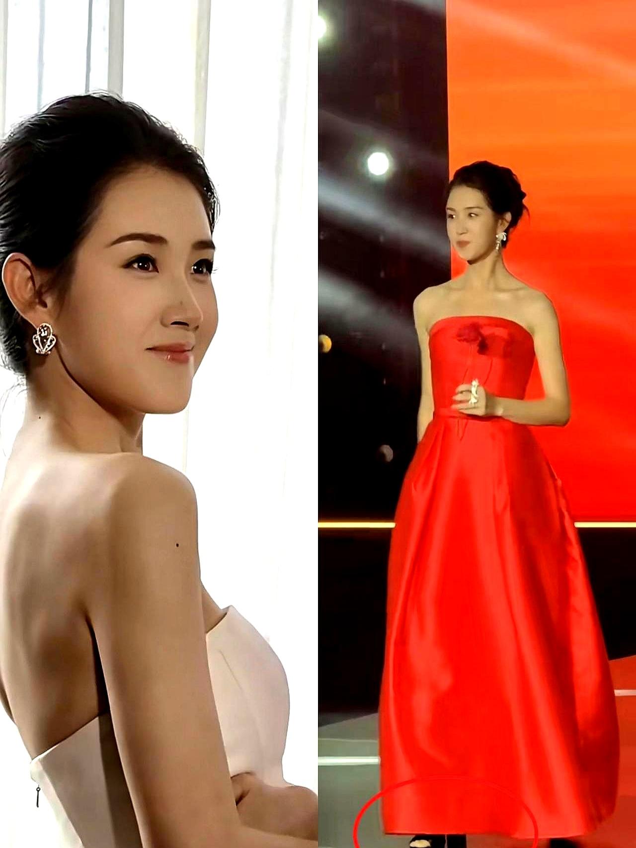 要不是有脸在那里撑着造型师直接给她穿上那件融入背景的红礼服，把更好看的白