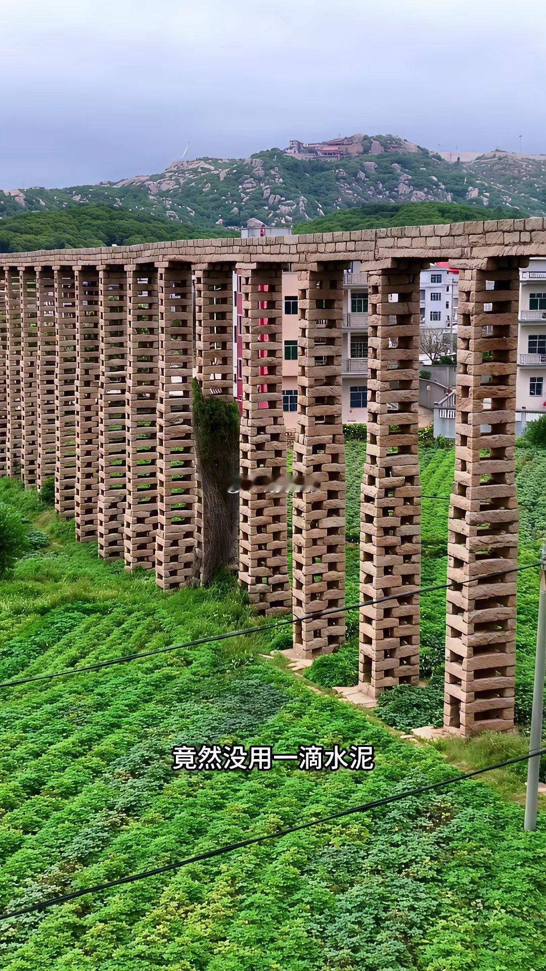 没有一根钢筋，没用一滴水泥仅靠上万块石条层层咬合莆田这座500米长的渡槽已在天上