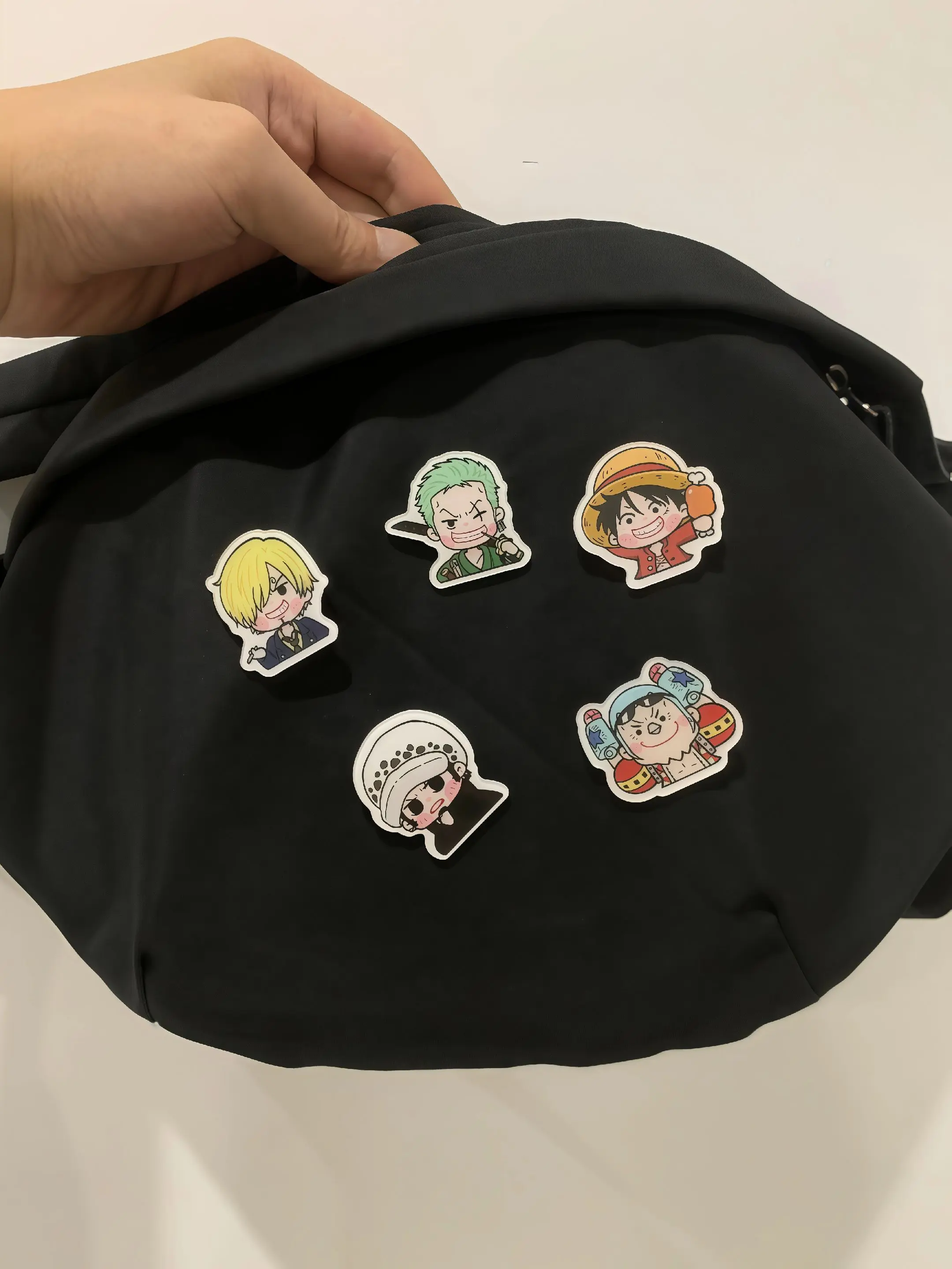 把这可爱的海贼王胸针 别包包上真得好看！