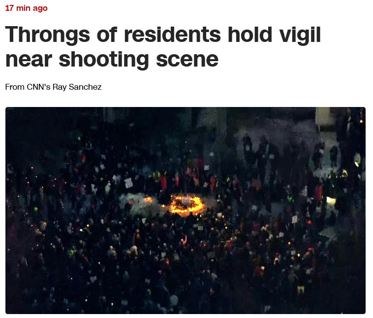 据报道，成群的明尼苏达州居民和活动人士在一片积雪上围成一圈，为一个由鲜花和蜡烛搭