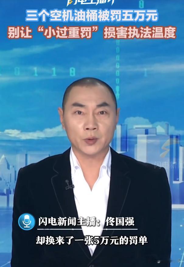 浙江温州，男子的汽修店正在做装修，临时把三个空机油桶放在门口，不巧这一幕正好被执