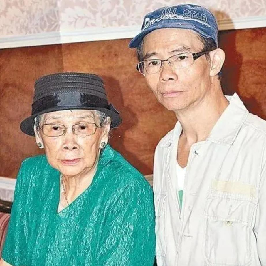 102岁的覃美金这辈子最遗憾的，应该是自己去世后，儿子梅启明居然全程不知情，