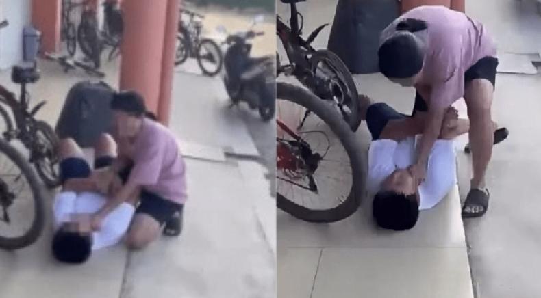 马来西亚一间小学爆发冲突，一名母亲不满孩子遭同学用羽球拍殴打，情绪激动地将出手的