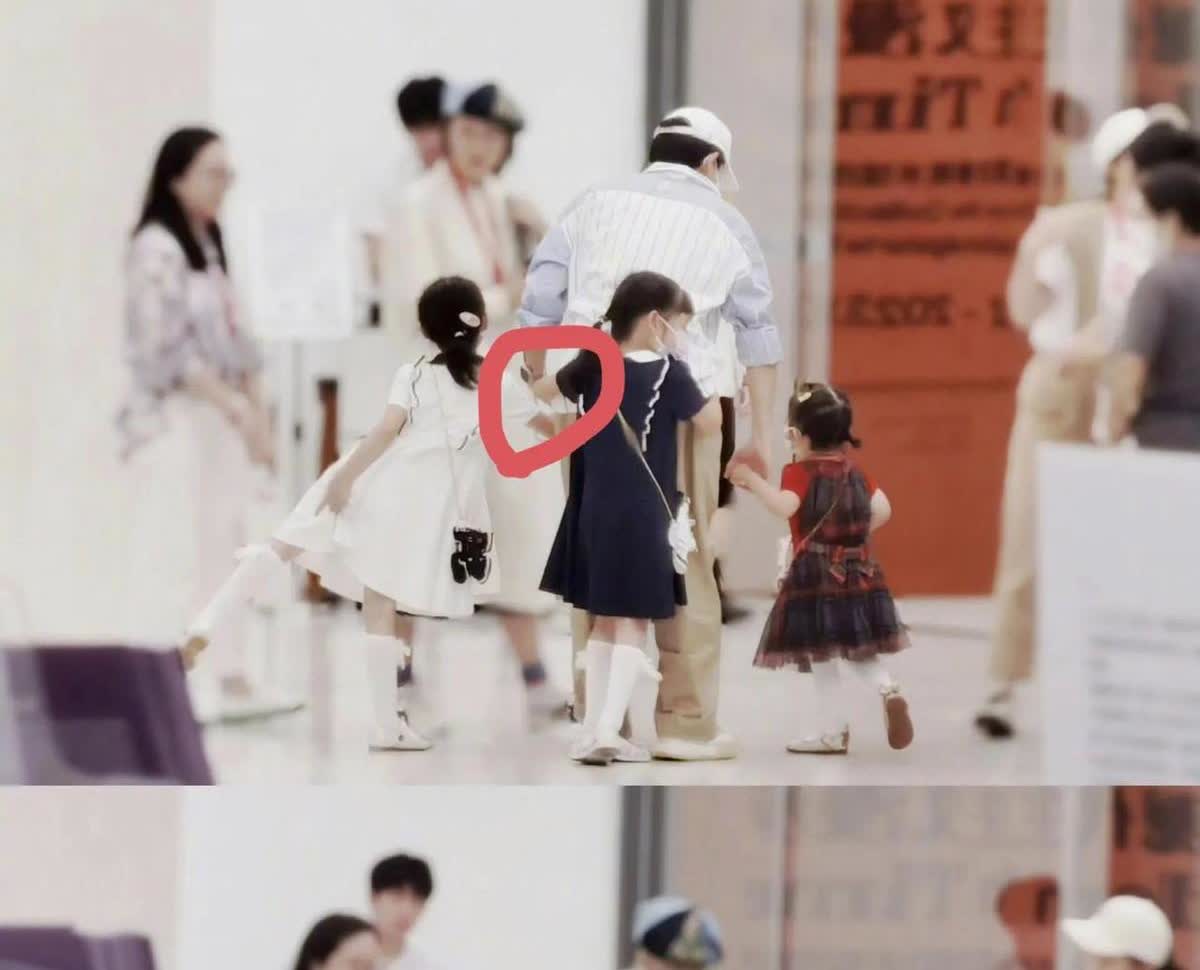 张杰带三个女儿出门好难啊！他只有两只手，但是有三个女儿，真是让人着急。昨