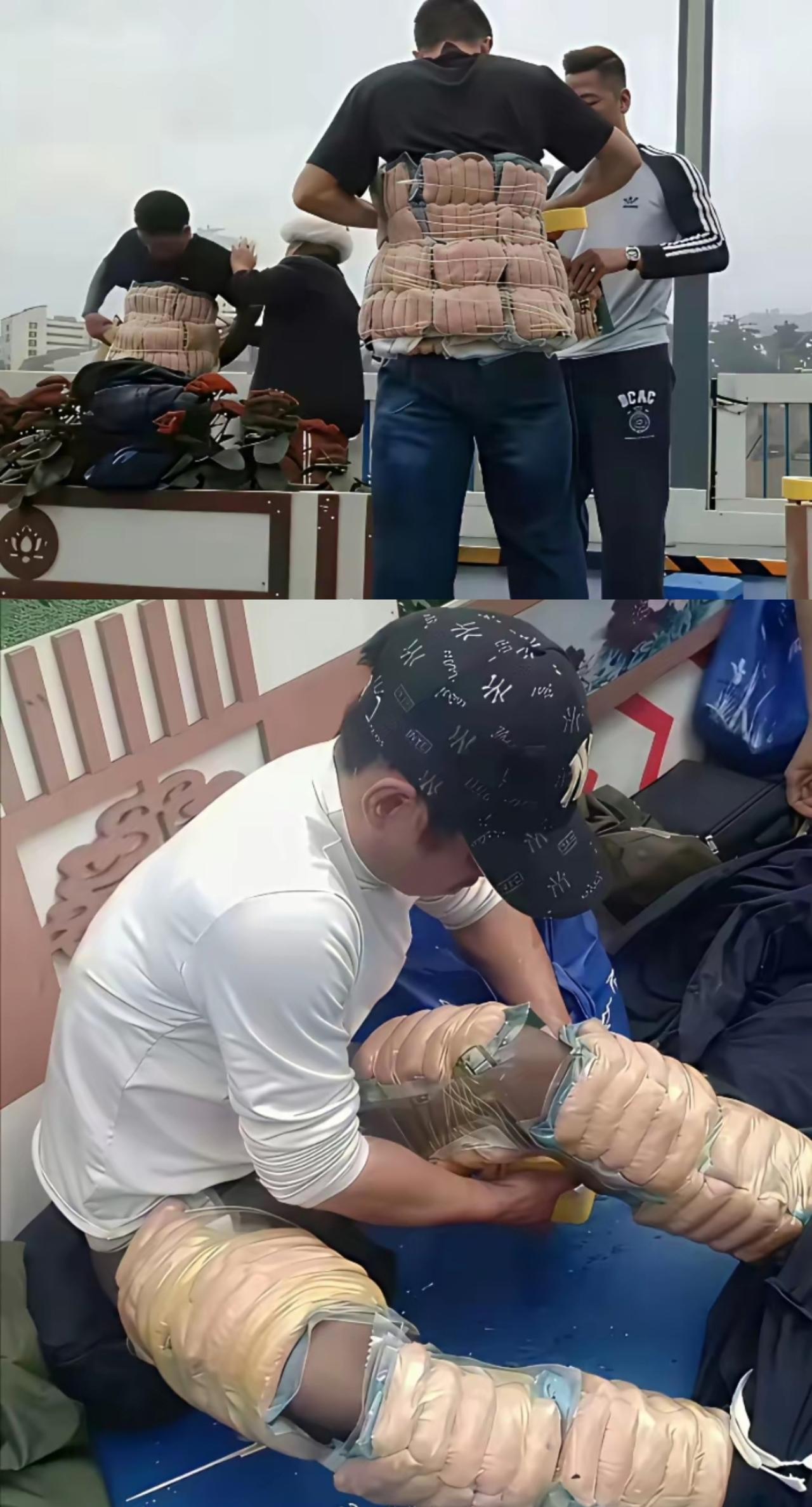厉害了！越南人全副武装，把中国烤肠一包包全绑在腰腹、大腿上，胶带密不透风缠满全身