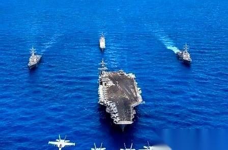 你琢磨一下这画面：老美那艘叫“林肯号”的航母，跟个铁疙瘩巨无霸似的，开到咱们家