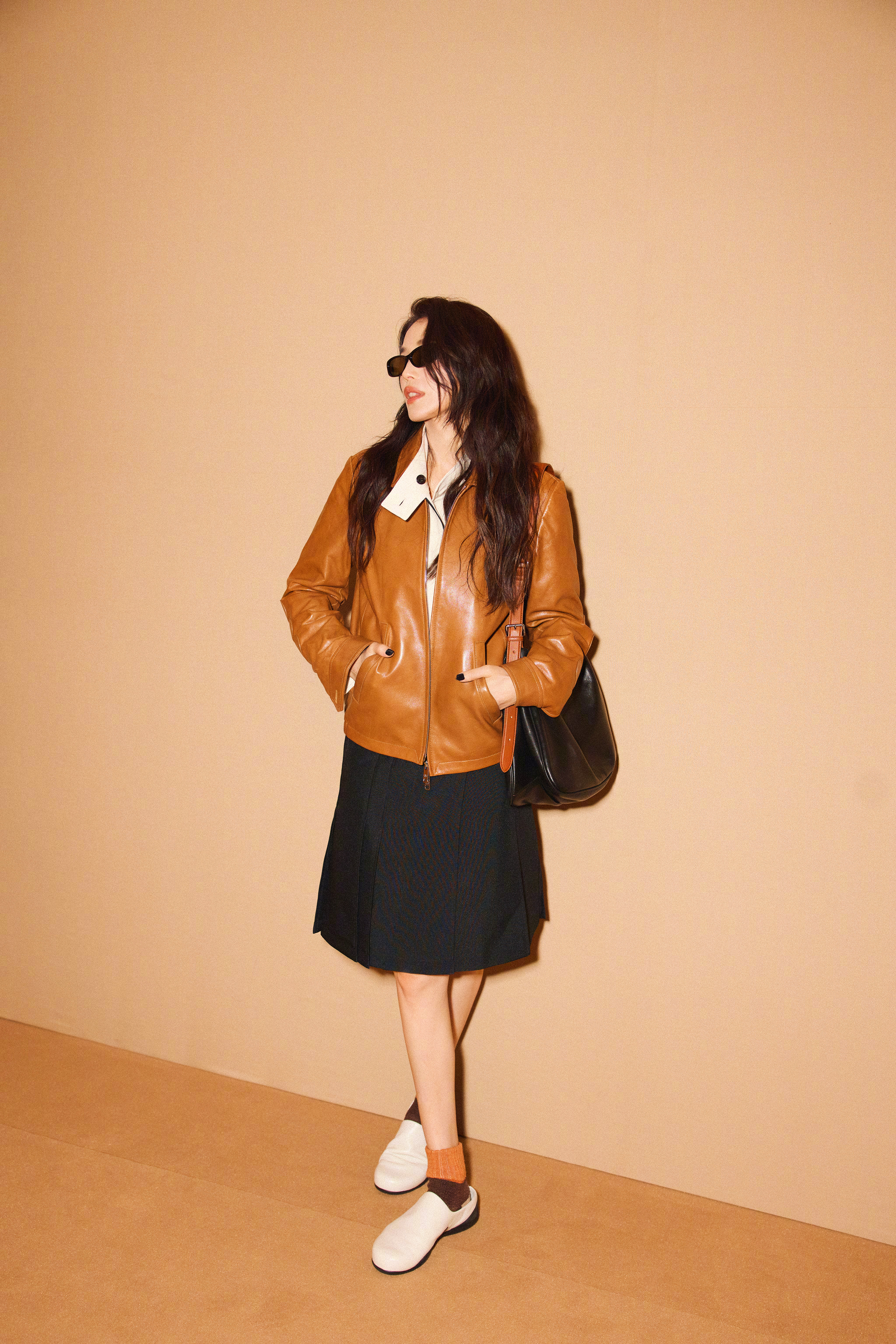 出席FILA“流动的都市”主题米兰大秀的舒淇，三套造型都好美，随性又不失时髦感