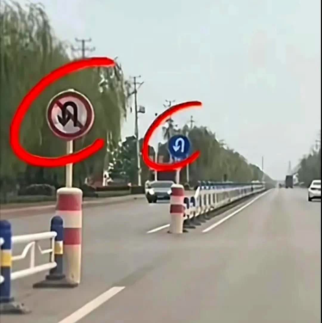 看到掉头标志就猛打方向盘的人，驾照是花钱买的吧？文章里那个蓝底白箭头标志