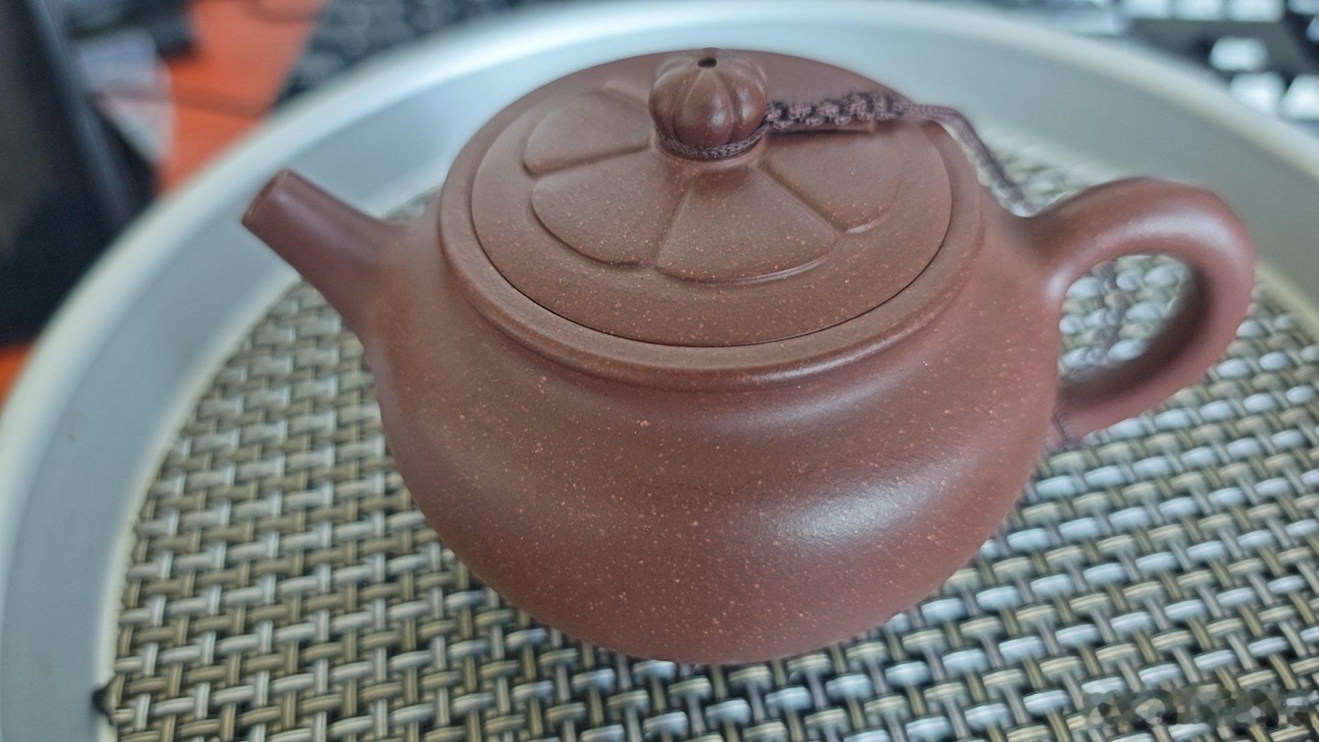 以前的紫砂壶有那种内推孔，这两年的大多是网孔了，这算技术进步还是退步了？