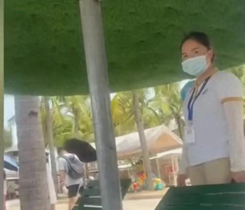 “活不起了？”三亚的海边本是放松好去处，女子却没料到，一屁股坐上路边的沙
