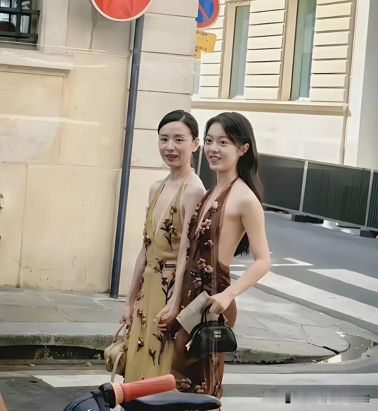 在街上邂逅这两位美女冷不丁一看，还以为是从难民营出来的实在是太瘦了！真不宜穿
