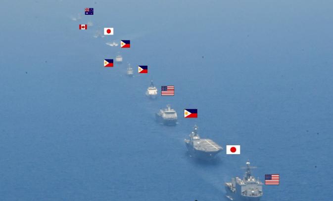 日本自卫队发布了“肩并肩”军事演习的现场照片，非常心机的将参演舰艇的国旗标注