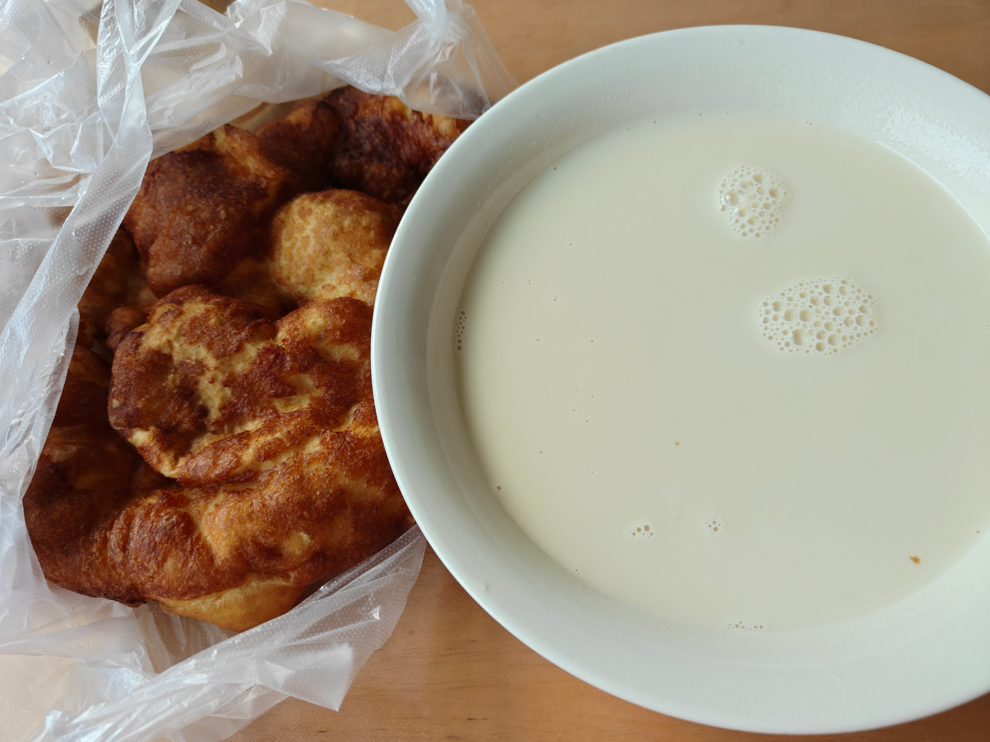 整个北方地道早餐纯豆磨的豆浆就是好喝知道图二是啥不？​​​