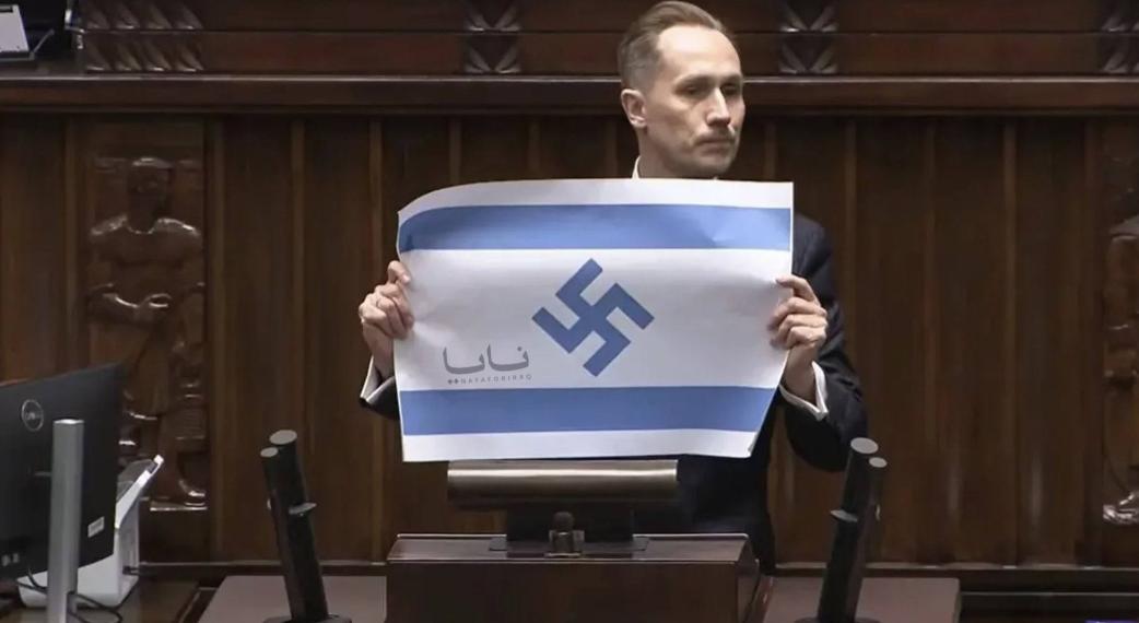 波兰议员公然篡改以色列国旗！4月14日，波兰众议院例行会议上，极右翼议