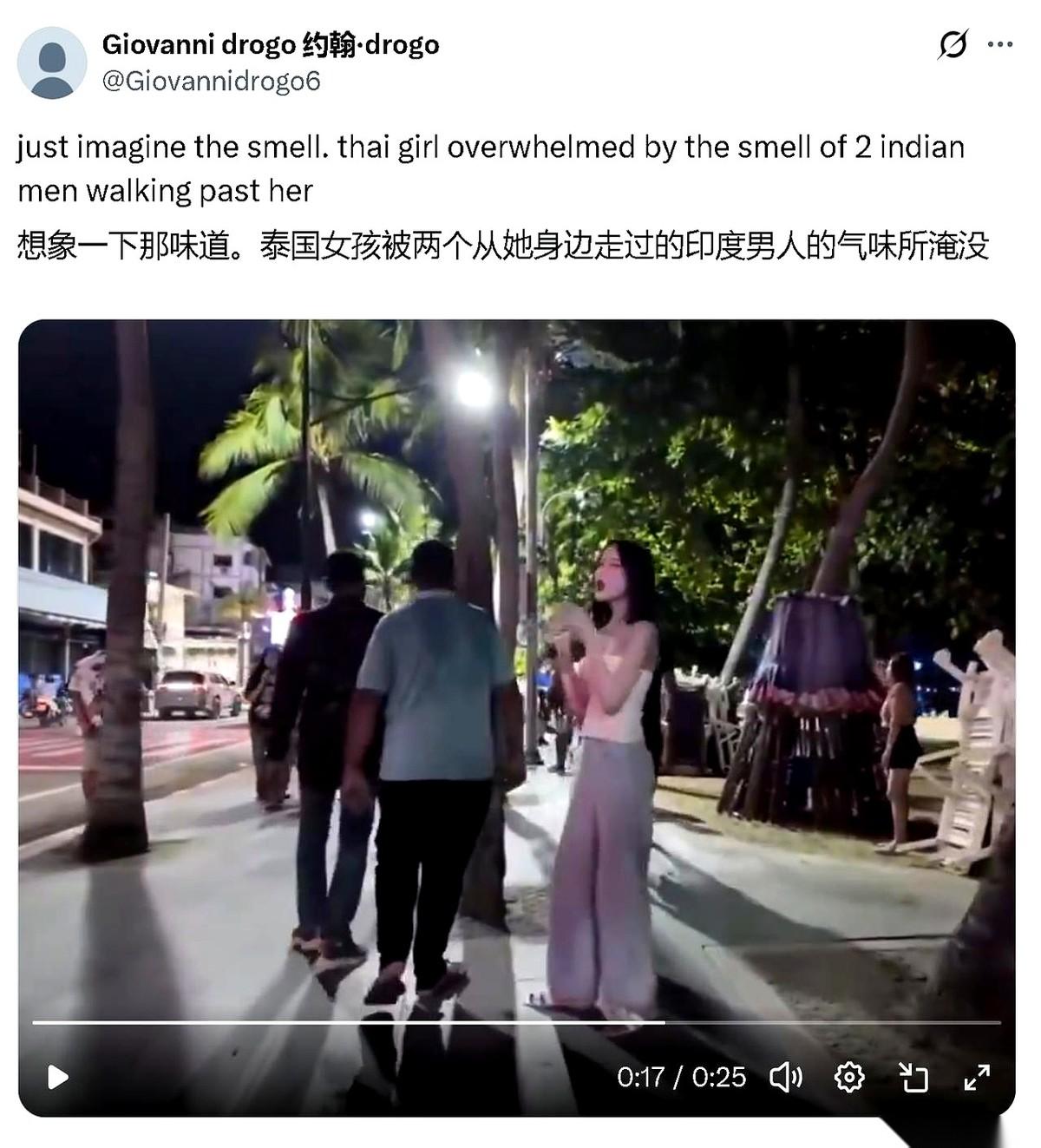 网上看到一段录像，镜头跟在两个印度男人身后，在东南亚一条湿漉漉的街上。夜风是黏