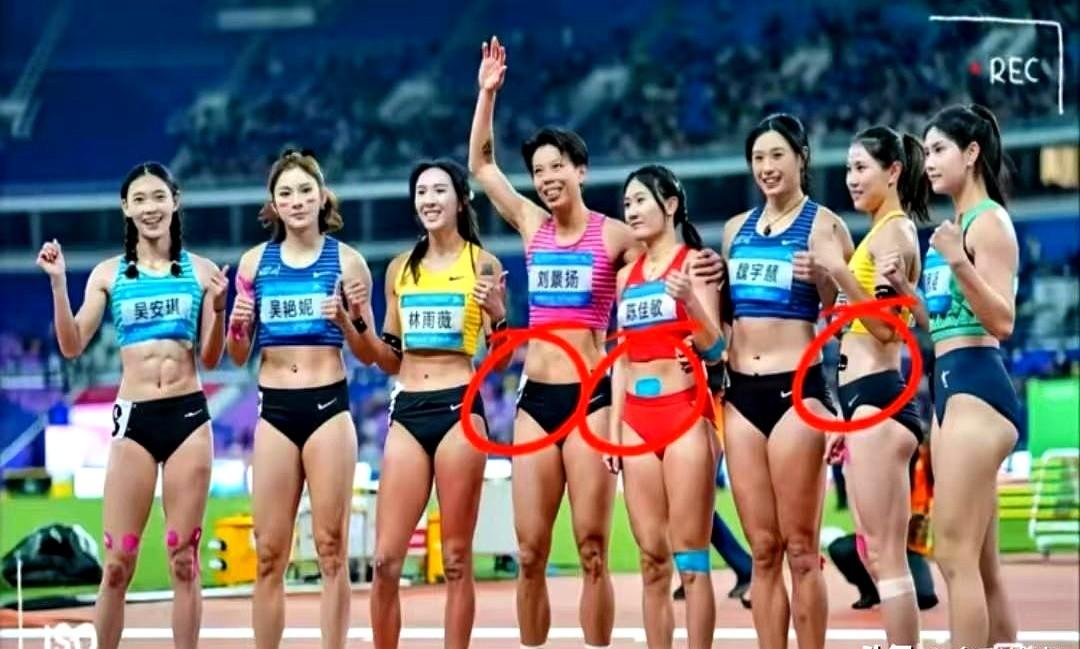 全运会跨栏0.04秒差距，科技贴纸决定冠军？我看着刘景扬肚脐上那个小点，听人说