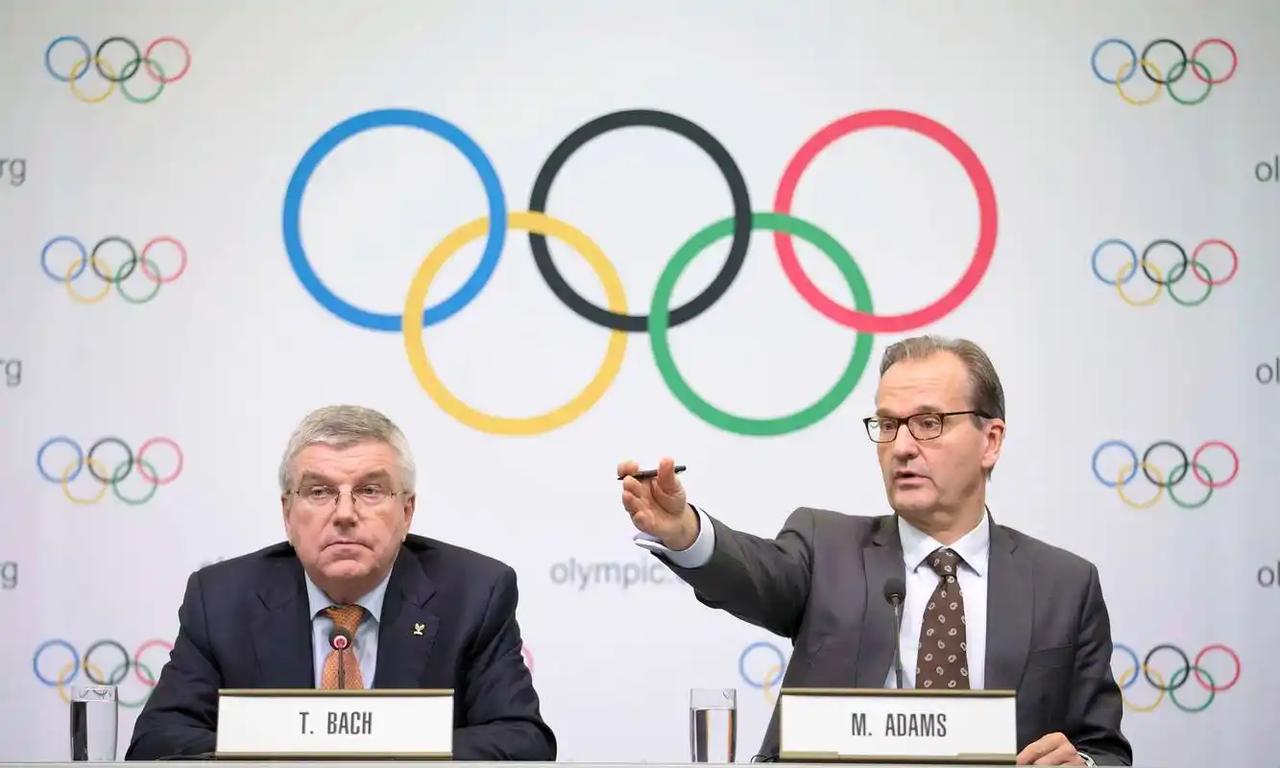 半路直接把申请书一扔，这画面，够不够带劲？国际奥委会现在估计头都大了，满世界