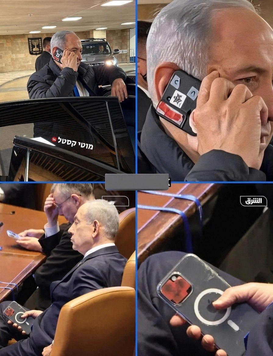 内塔尼亚胡的手机已经很旧了，但他在手机上贴了胶带。普通人通常不会在手机摄像头上