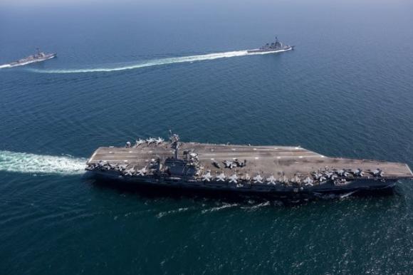 美国想要打击伊朗，那么美国就要放弃威胁中国，原因很简单，那就是美国的航母不够用了