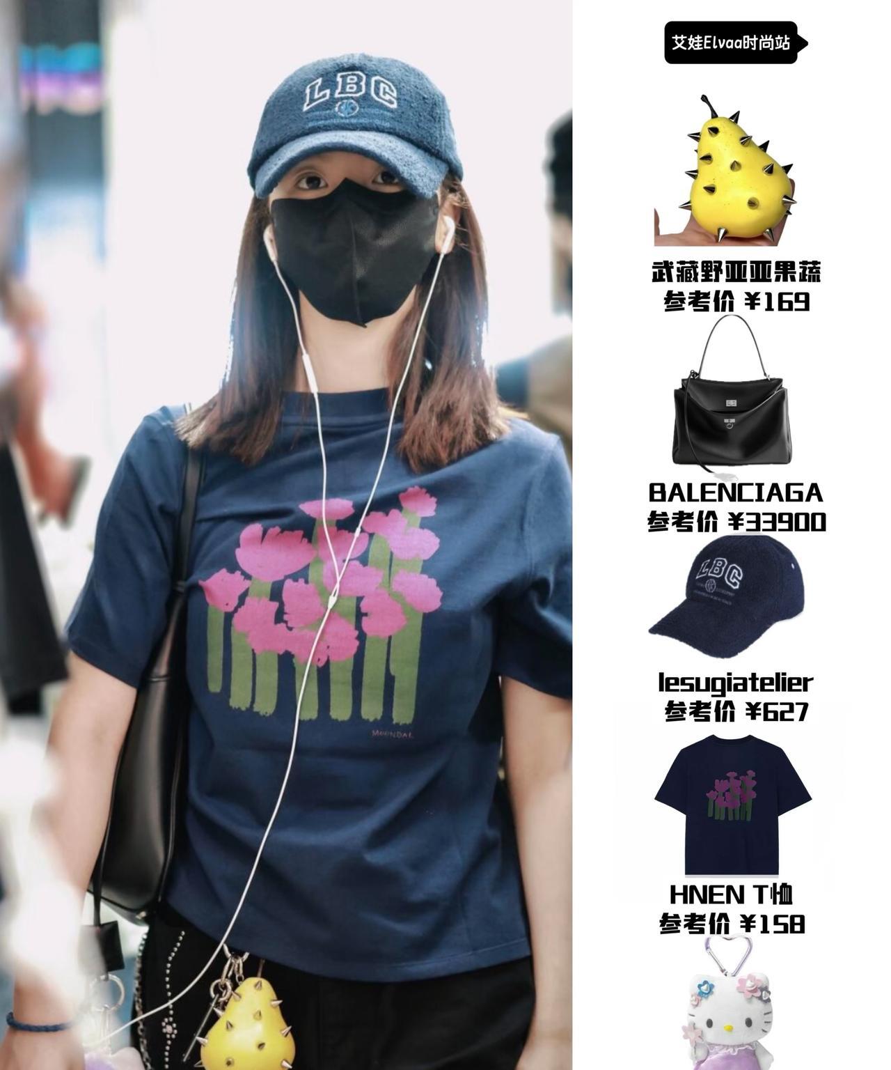 杨超越走机场，第一眼没看出来是谁。杨超越穿着藏青色T恤，搭配一条黑裤子，简单随性