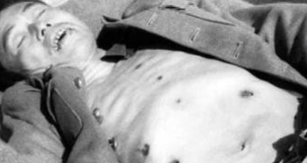 1949年，张庙堂村附近的农田中，邱清泉阵亡后的照片。镜头下的他仰面朝天，身上的