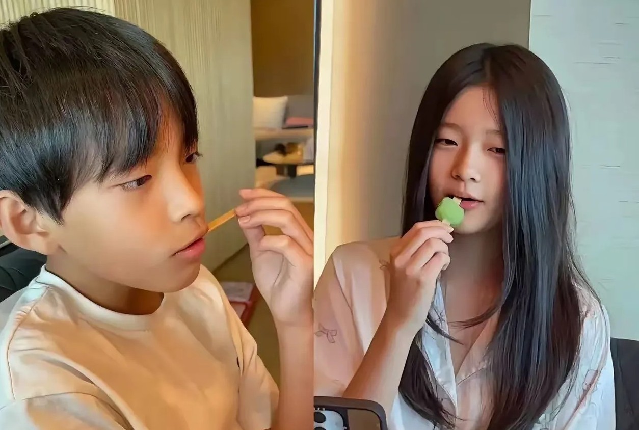 小菲的两个孩子参加夏令营回来了，两姐弟的正面照也曝光了，姐姐神态像妈妈，眼睛，像
