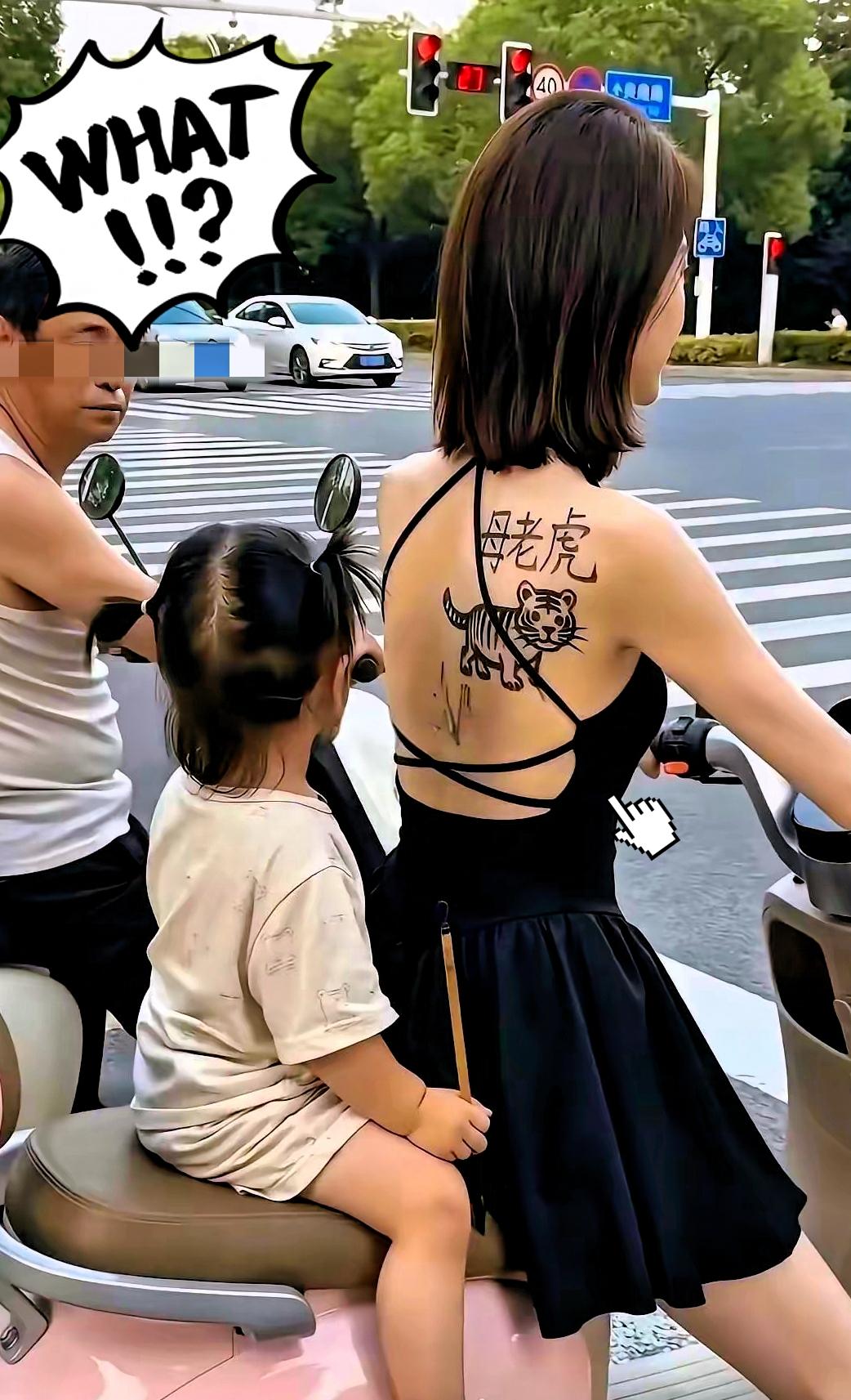 路口红灯短短几十秒，一幕画面看完又好笑又心酸！小女孩坐在电动车后座，拿着画笔，