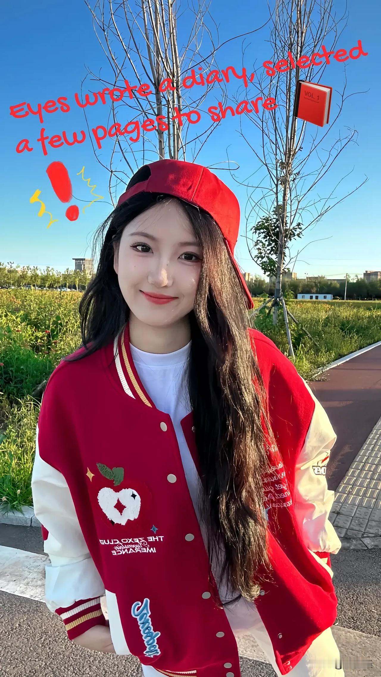 穿红色外套的女孩在户外拍照。