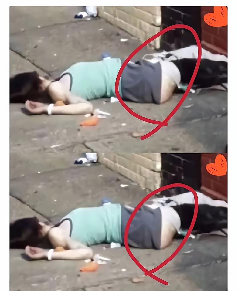 美国街头拍到的一幕，一个年轻姑娘倒在路边，裤子都褪到大腿根了，神志不清地瘫着。你