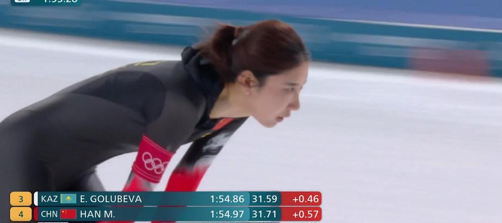 2月20日晚的米兰冰场上，韩梅冲过终点线后弯下腰，大口喘着气。1分54秒97—