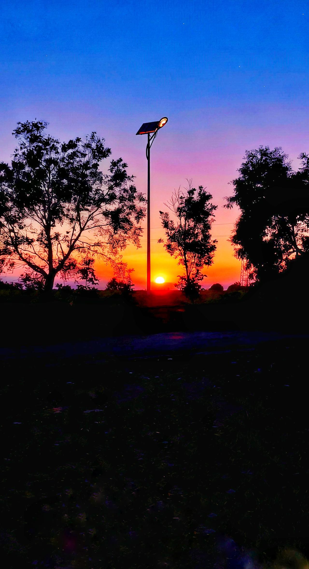 余晖温柔告别白昼，星河璀璨迎接夜晚。手机摄影落日余晖落日晚霞最美晚霞