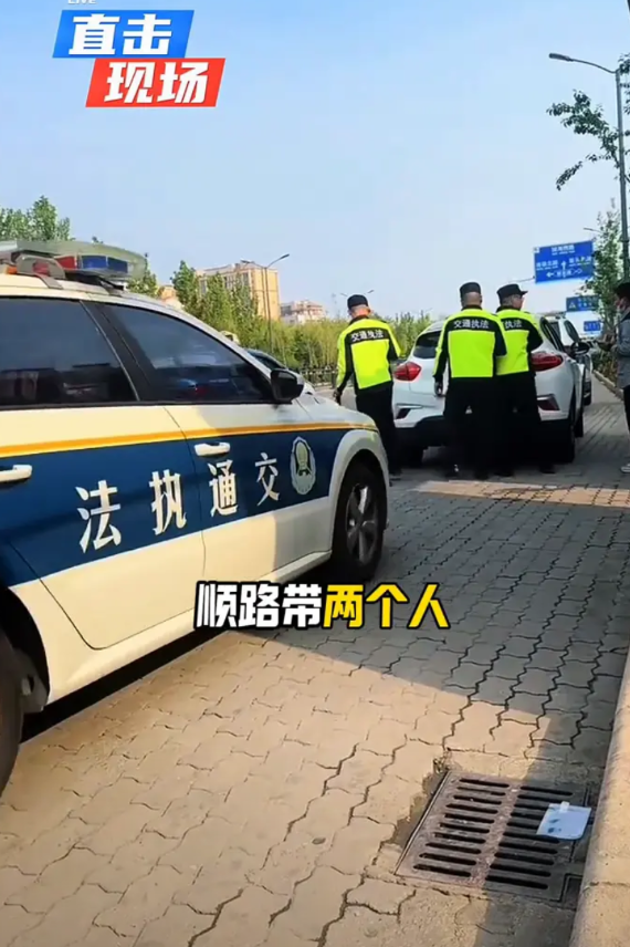 跑顺风车被拦下怎么处理？我就开车回老家，顺路带两个人，居然说我非法营运，还把我