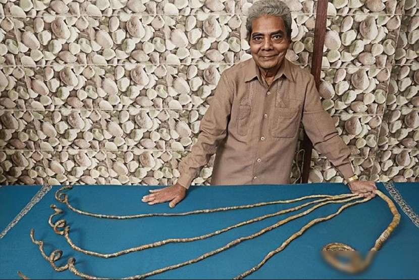 2018年，印度一老翁毅然剪掉留了66年，长达9.09米的左手指甲。没想到剪掉指