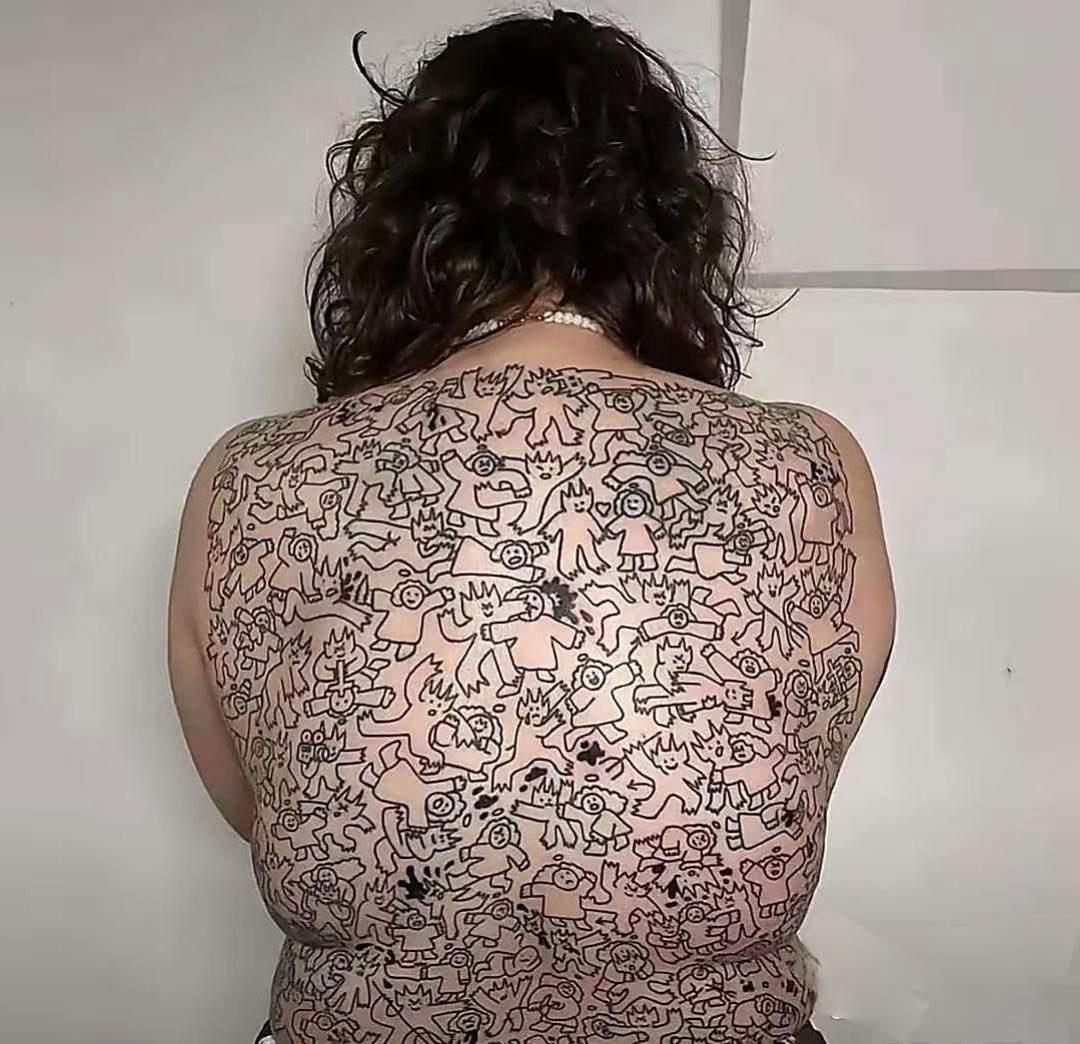 这个纹身是谁设计的？纹的是什么意思？有谁看懂的请告诉我！时尚女纹身女生纹身图片