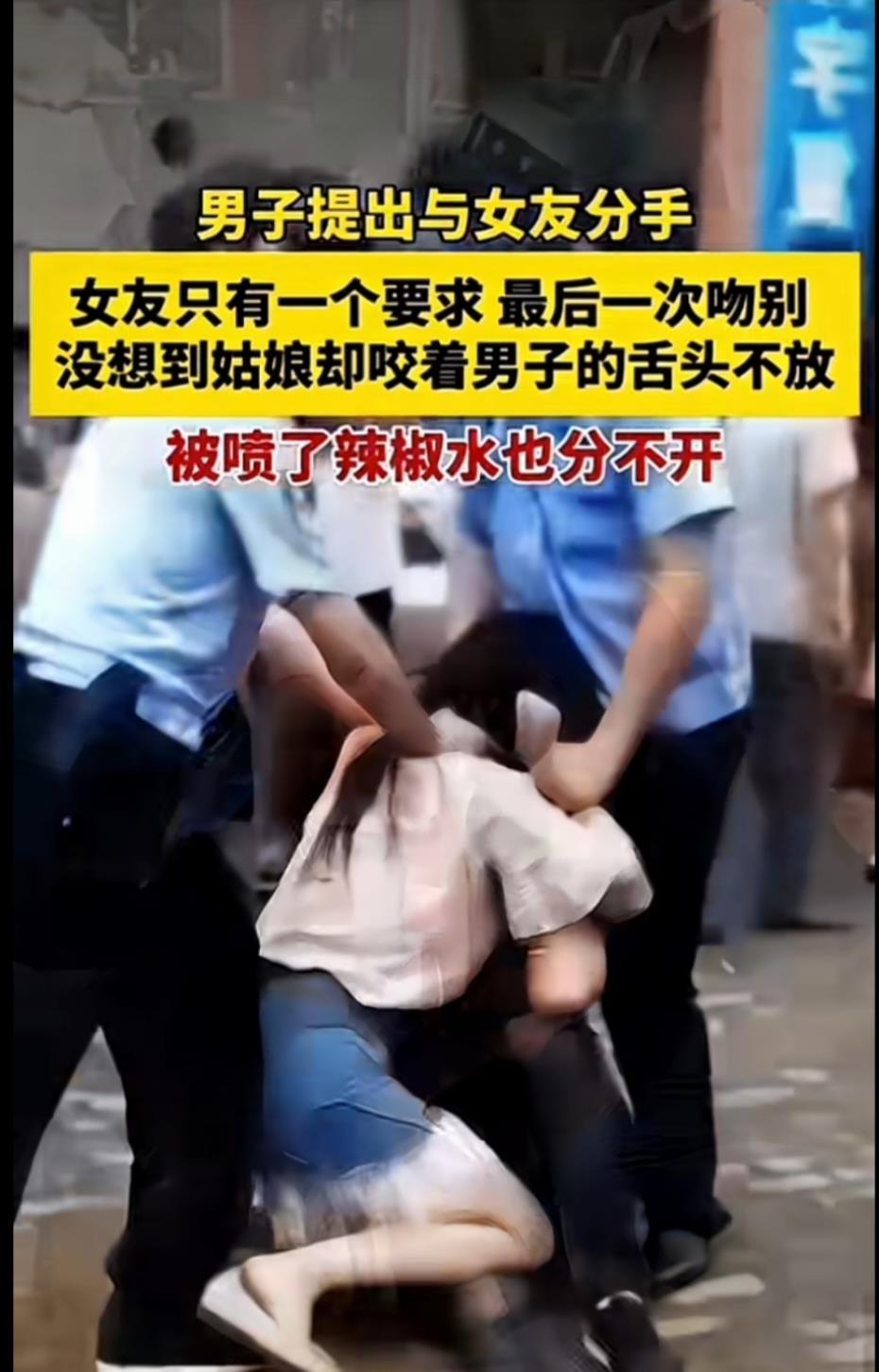2018年5月20日，安徽潜山街头，一对情侣嘴对嘴“吻”在一起，路过的行人还笑说