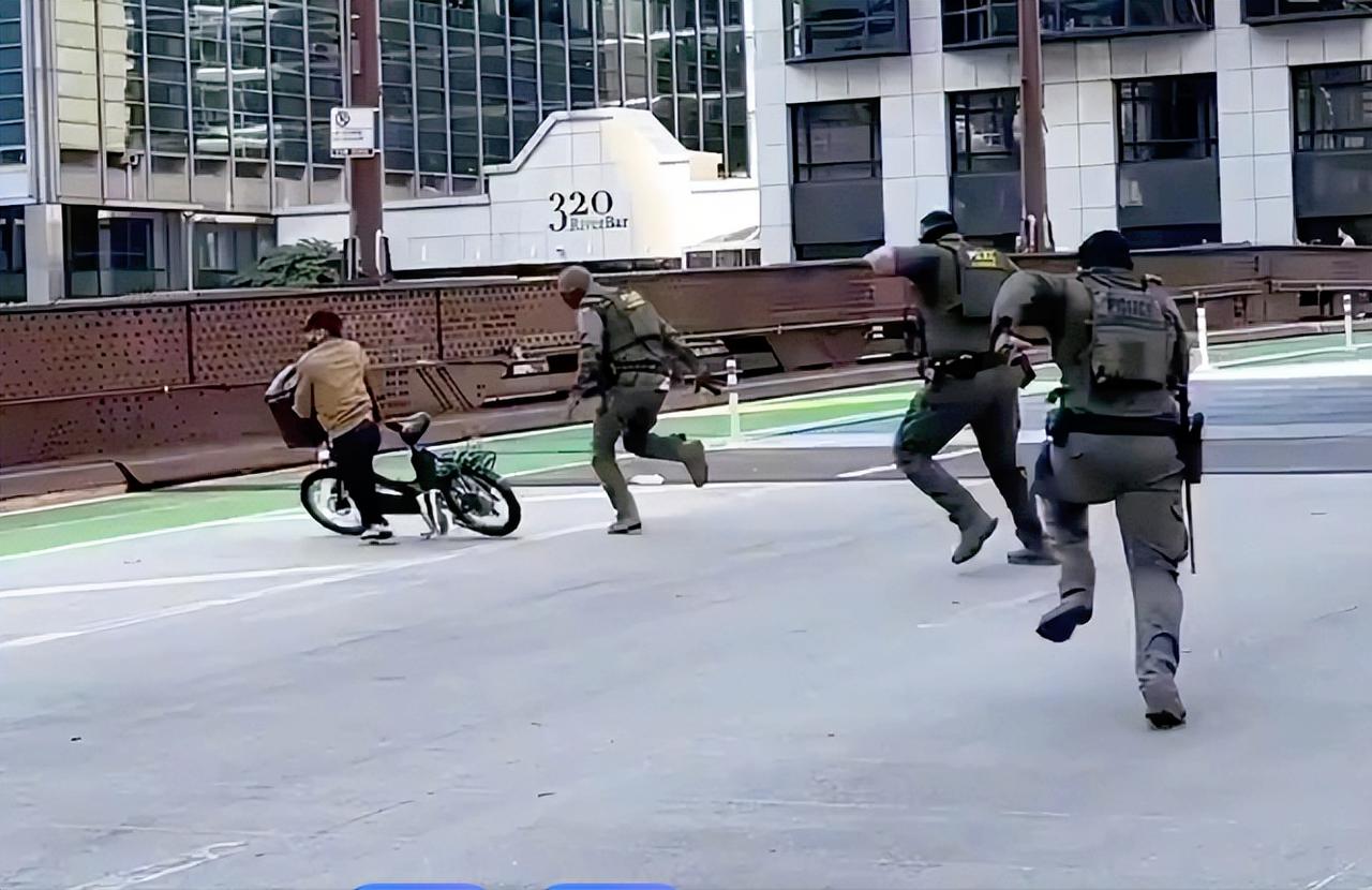 美国联邦政府和地方杠上了！在明尼苏达州的明尼阿波利斯市，37岁的美国女子在移民与