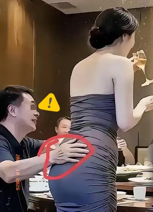 杭州一张年会饭局照突然刷屏。画面里穿西装的男人手落在旁边女生腰臀交界，配文直接
