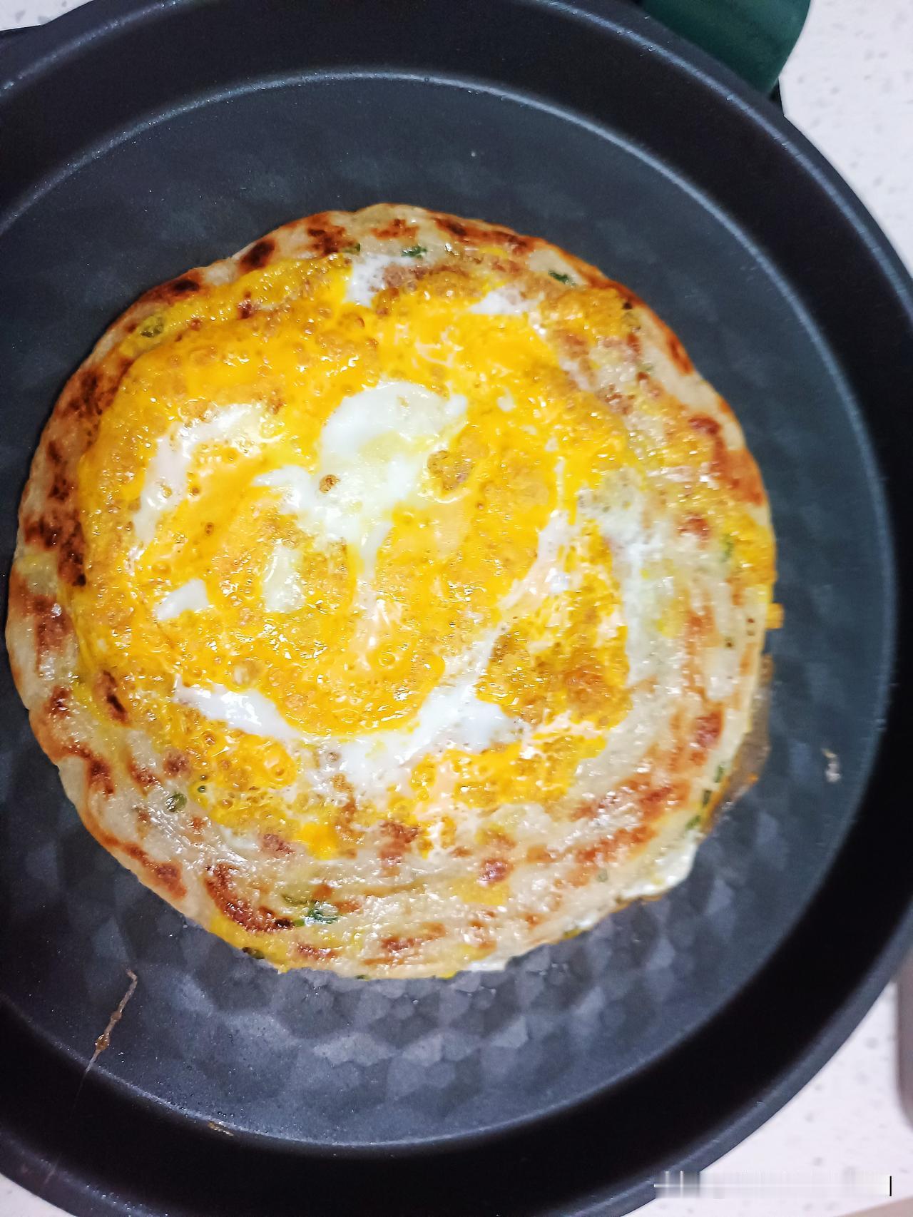 晨光熹微一缕温暖自早餐升起是味蕾的期待也是生活的诗意电饼铛里香葱手抓