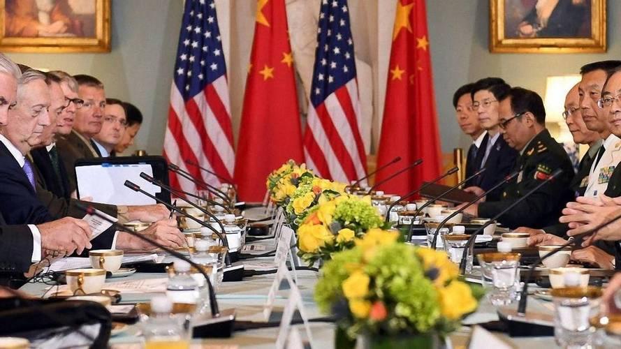 美：老弟！把大豆合同签了。中：啥合同？美：我们的大豆采购合同，都谈了3天了