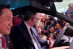 塞尔维亚总统武契奇试驾中国的小米汽车，网友建议雷总送一辆小米汽车给“577”，而