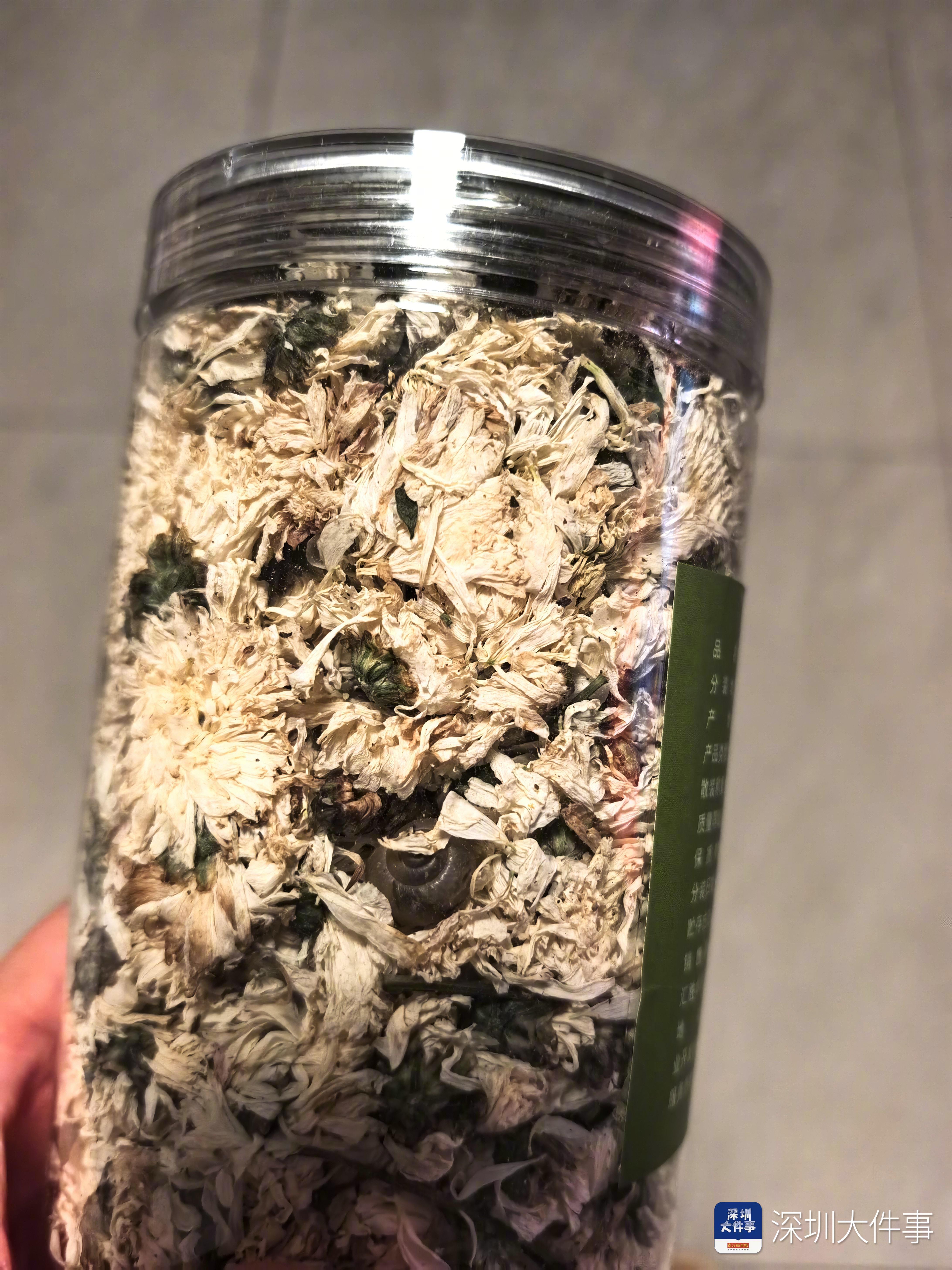 网购杭白菊惊现死蜗牛，商家拒赔引发消费者维权行动