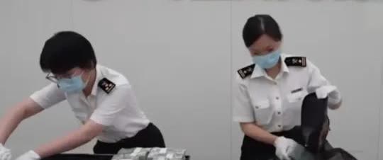 深圳福田口岸，男子带230万美元现金回国，给海关查获了。按规定带5000美元现金