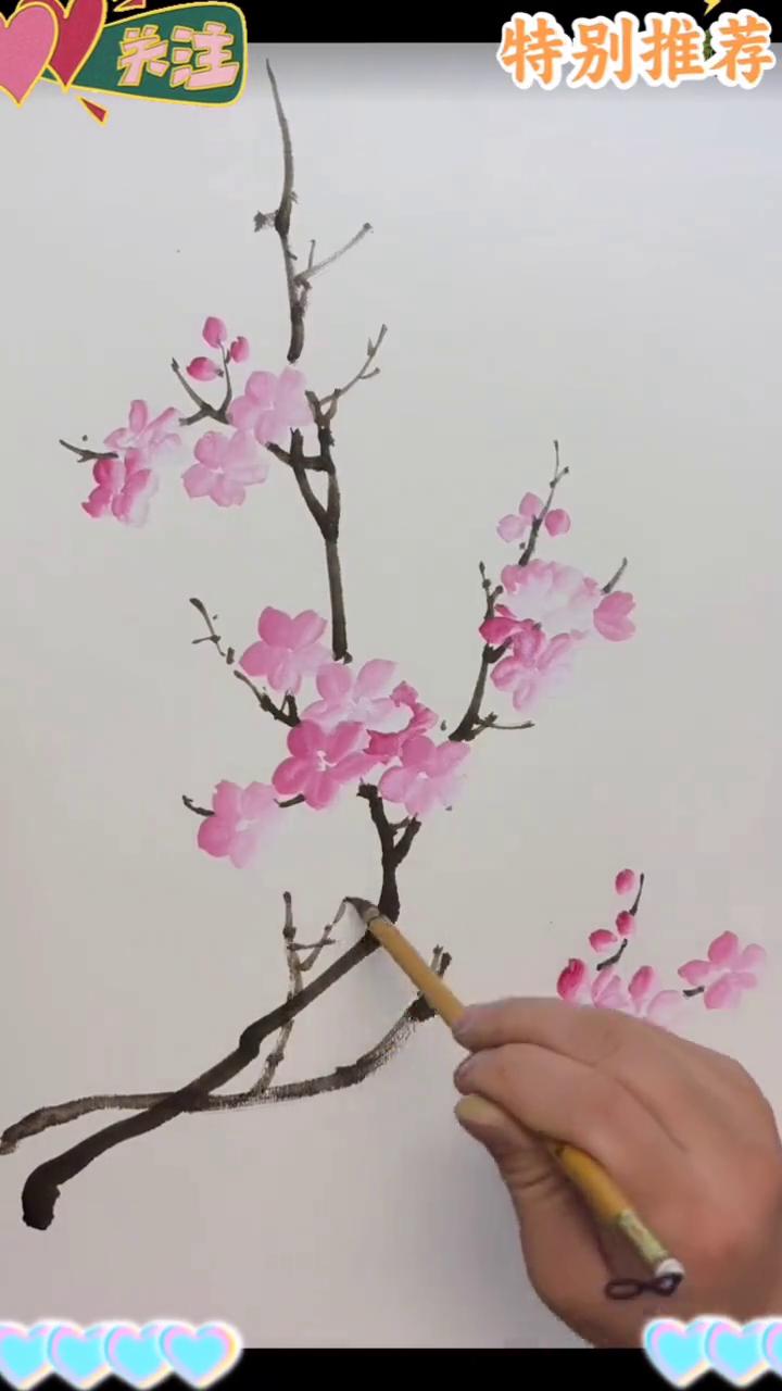 桃花画法。特别推荐：传播美术知识。·笔肚钛白，笔尖少量曙红，两笔组合成一个花