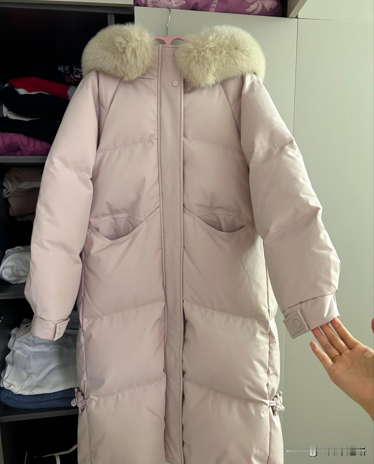 我和我姐因为买羽绒服较上劲了她看我新买的羽绒服标价一千多，直说我不会过日子。