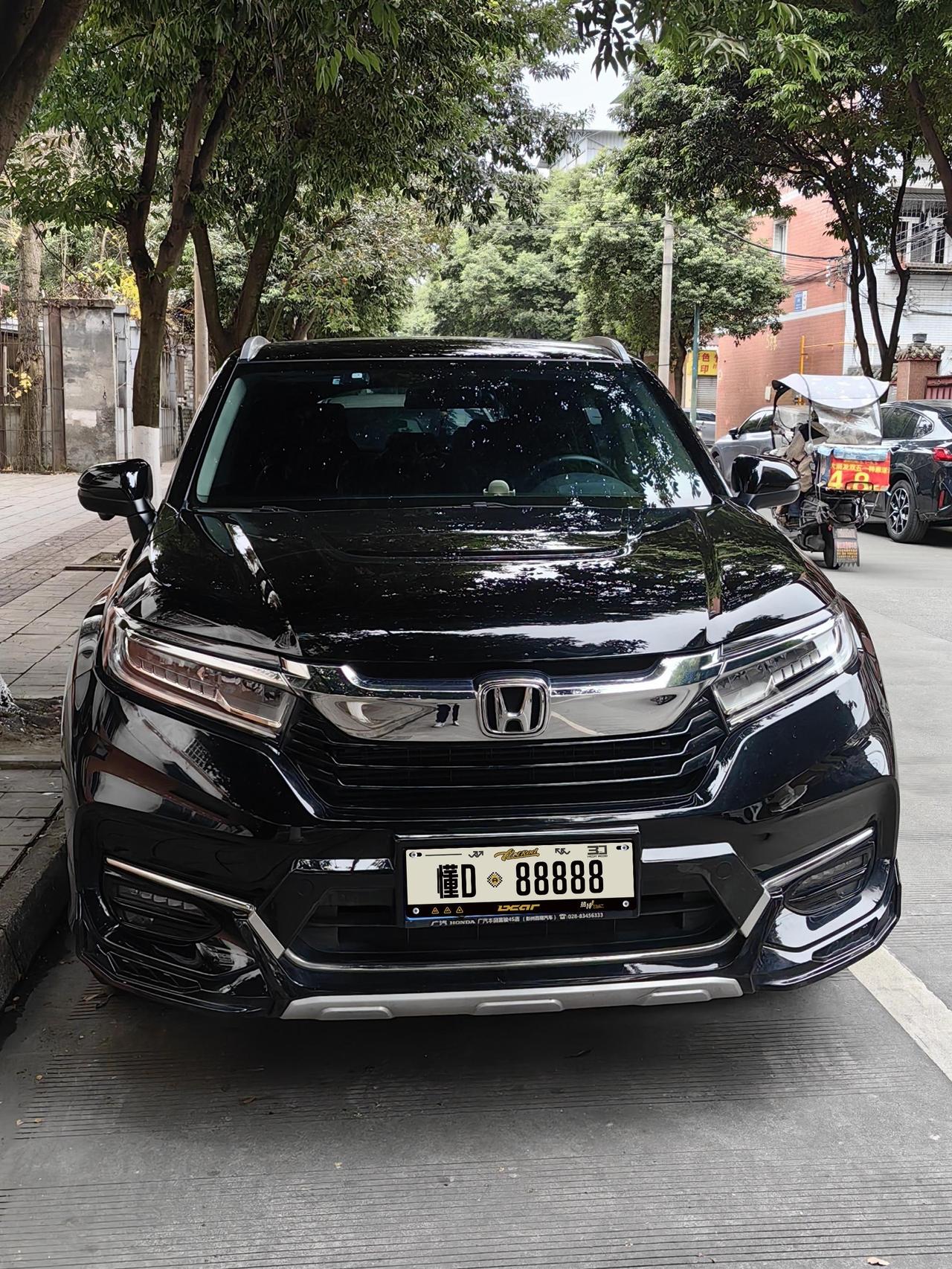 我的车型是2020款本田冠道1.5t，黑色款，在提车时，也考虑过贴膜，后面也因为