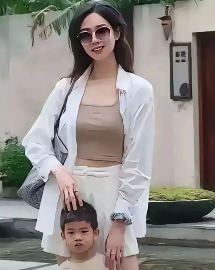 释永信的女人与孩子曝光，难道她的美丽是他背后的秘密武器？如果他被调查，她的未来又