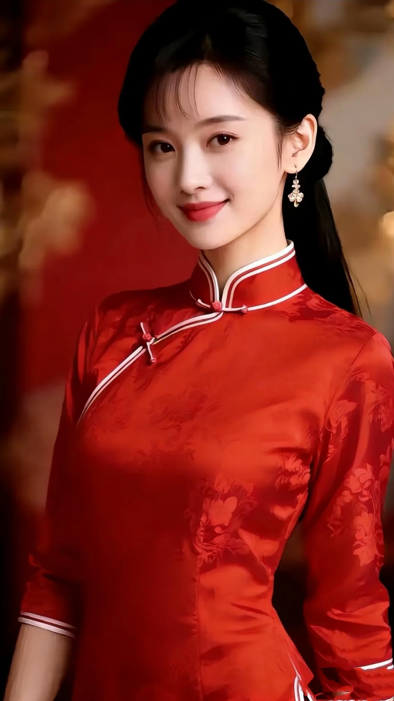 《红襟栖暖堂》暖光轻笼的室间里，她立在其中，正红旗袍如浸了柔霞的锦，暗纹花