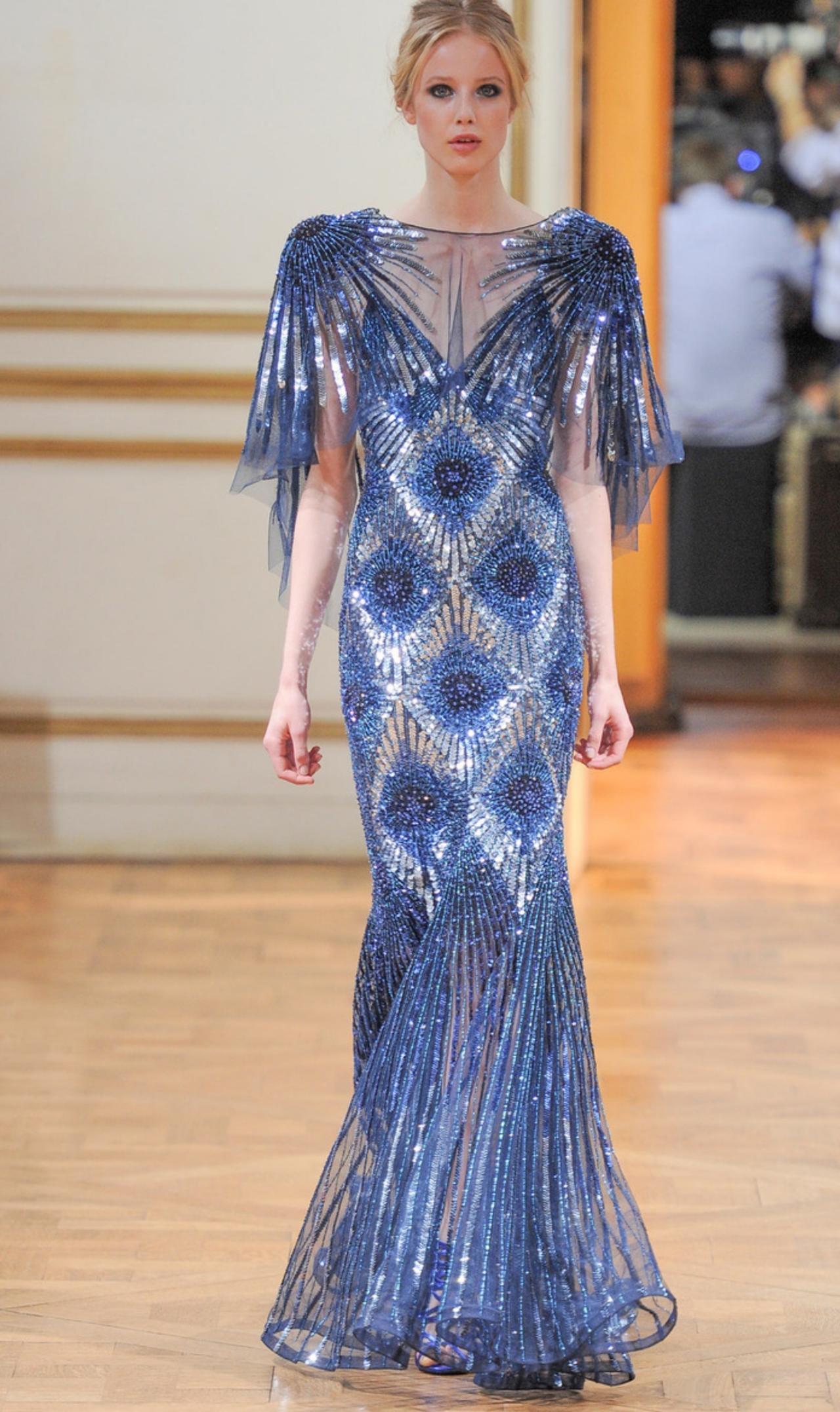 ZuhairMurad2013秋冬高级定制的廓形以鱼尾裙为主线，将女性身体的