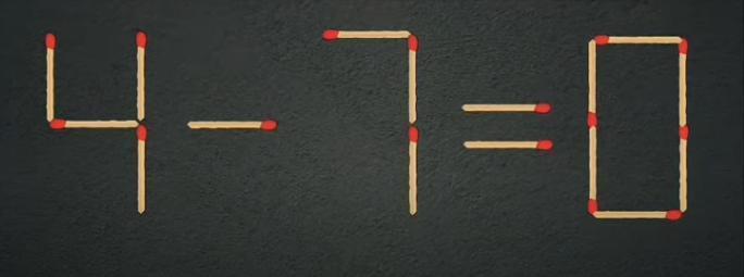摆出的火柴等式4-7=0，是错误的。游戏要求只移动一根火柴棒来修正。要