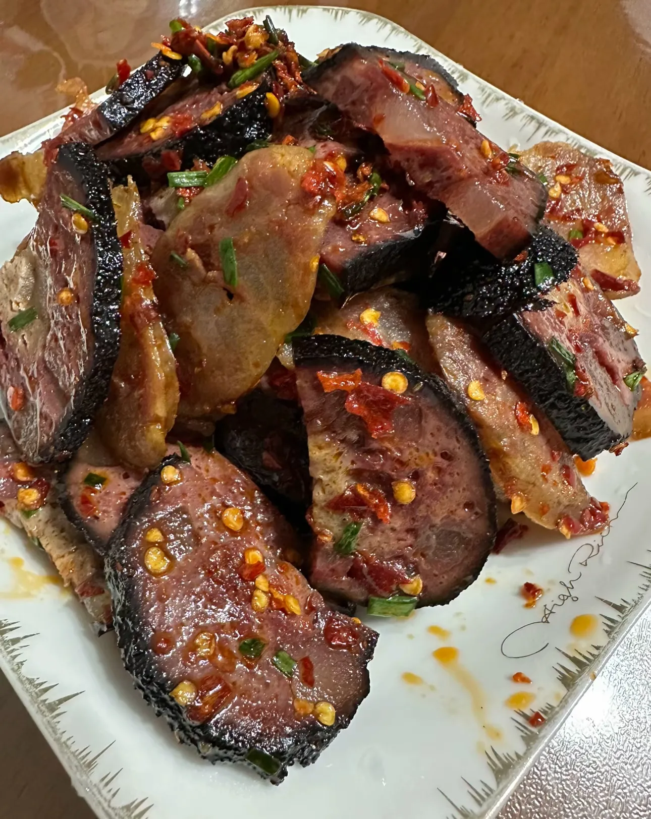 这道菜是哪里人的标志？